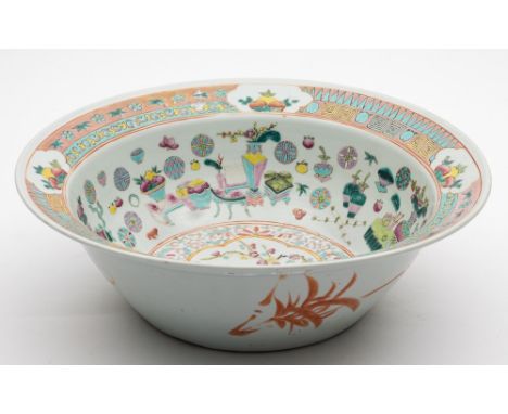 A Chinese famille rose basin: painted to the centre with a peacock amongst prunus and peony, the sides with numerous auspicio