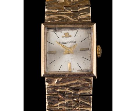 A lady's 9ct gold quartz movement wristwatch: with Jaeger-LeCoultre dial and crown on a 9ct gold mesh bracelet, (dial and cro