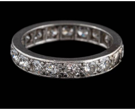 A diamond eternity ring: pave-set with eighteen round, brilliant-cut diamonds estimated to weigh a total of 2.30cts, ring siz