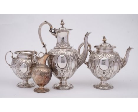 A Victorian electroplated four-piece tea and coffee service: of ovoid outline, with embossed foliate and scroll decoration, r