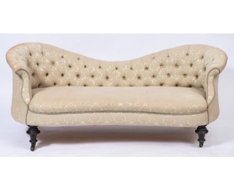 A Victorian ebonised frame settee:, with serpentine upholstered stuff over button down back and curved ends and with a concav