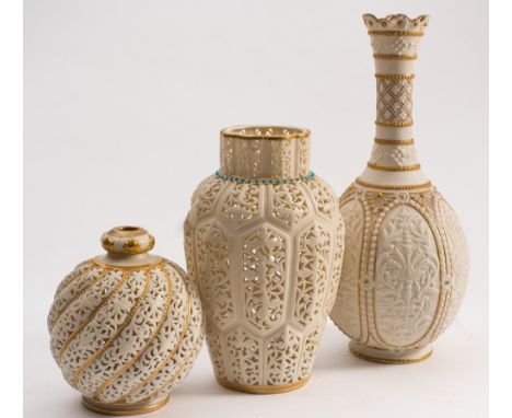 A Grainger & Co. Worcester reticulated vase, one similar and a Copeland parian vase: the first of ovoid form with cylindrical