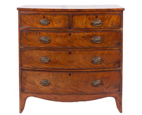 An early 19th Century mahogany and inlaid bow-fronted chest:, the top with a wide satinwood crossbanded border, within boxwoo