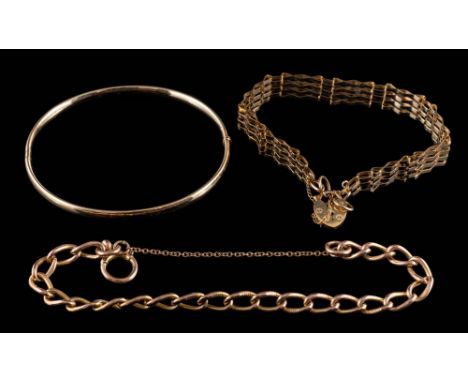 A 9ct gold three bar, gate-link bracelet, a 9ct gold bangle and a 9ct gold curb-link bracelet: approximately 22.5gms gross we