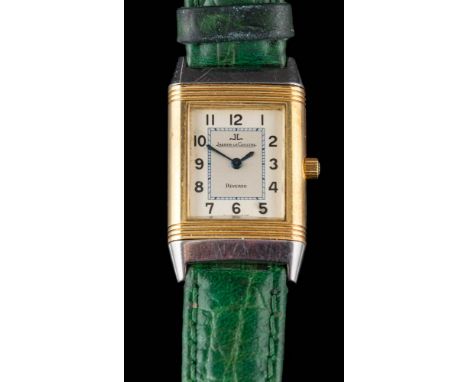 Jaeger LeCoultre. A lady's Jaeger LeCoultre Reverso, bi-metal wristwatch: numbered 260.5.08 and 1725979, the rectangular dial