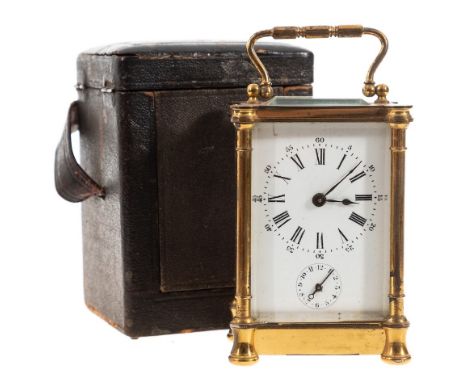 An Edwardian French brass carriage clock: the eight-day duration timepiece movement having a later platform lever escapement,