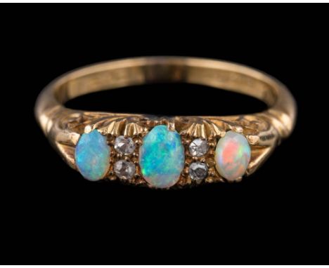 An 18ct gold, opal and diamond seven-stone ring: set with graduated, oval opals between single-cut diamonds, ring size Q 1/2.