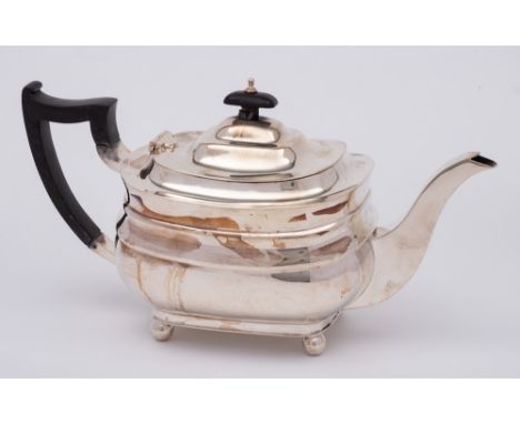 A George V silver teapot, maker Jay, Richard Attenborough Co Ltd, Sheffield, 1932: of plain barge-shaped outline, raised on b