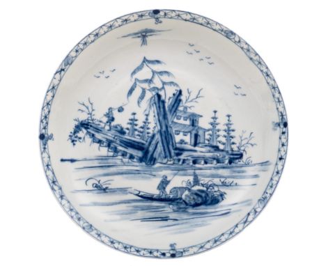 A fine First Period Worcester saucer dish: of slender shape with ogee rim, painted in the 'Romantic Rocks' pattern [I.B.8], w