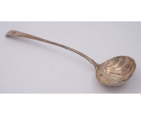 A Georgian Old English pattern silver soup ladle, all marks rubbed and worn: initialled,  with shell-shaped bowl, 35cm long, 