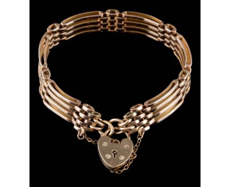 A 9ct gold four-bar gate-link bracelet: with 9ct gold heart-shaped clasp approximately 20gms gross weight. 