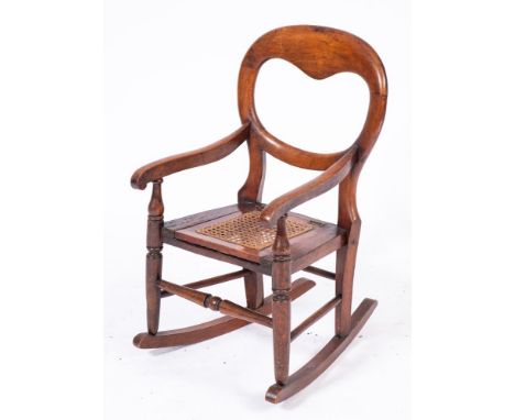 A child's Victorian cane seat commode chair and a cane seat chair.