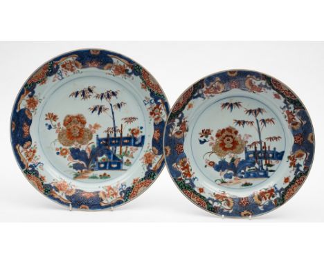 A pair of Chinese verte/imari chargers, a pair of matching chargers and a pair of matching plates: each painted in underglaze