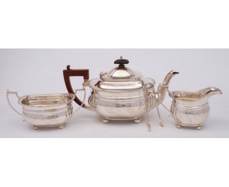 An Edward VIII silver three-piece tea service, maker Adie Brothers, Birmingham, 1936: of barge-shaped outline, with gadrooned