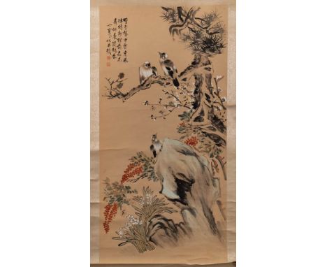 A Chinese scroll painting, signed Ding Bao: of birds perched on a flowering tree and rockwork, two seals for 'Linyang Dinboa'