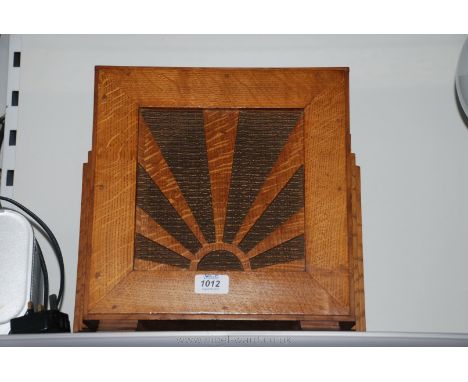 An Art Deco Oak cased Speaker with sunray decoration.