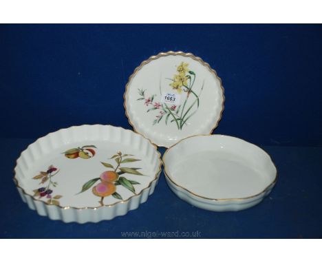 Three Flan dishes including Royal Worcester Evesham, a white and gilt Royal Worcester and a Spode Narcissuse Crowea.