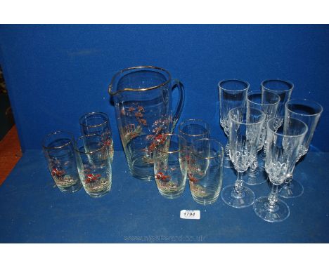 A Lemonade Set comprising Jug, six glasses with a hunting scene and six cut Crystal Champagne Flutes.