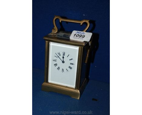 A Brass Carriage Clock with enamel face.