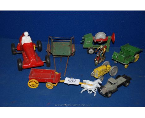 A box of toys including 'Condon' die-cast dumper, die-cast Tractor, Dinky 1930's style lorry, chassis, die-cast duckboard and