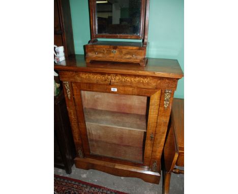 A good 19th c. Walnut Pier Cabinet, having rectangular top on burr frieze with transfer decoration, the single pane door open