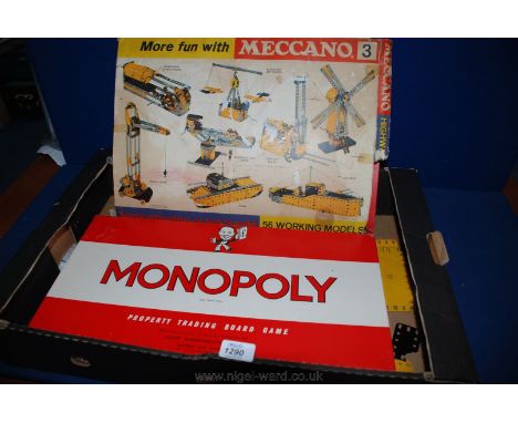 A box of Meccano #3 along with a boxed game of Monopoly.