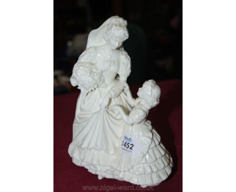 A Royal Worcester 'Wedding Day' figure.