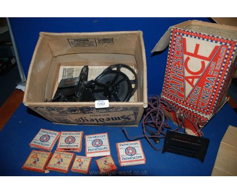 A ''Pathescope Ace'', 9.5mm centre drive Home Cinema Projector with original box (distressed), spare bulb and instructions, t