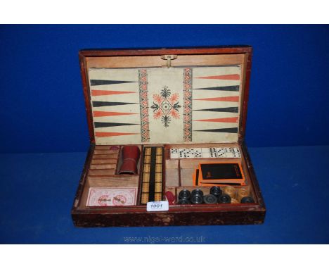 A cased Compendium of Games including draughts, dominoes, cribbage, playing cards, board, etc.