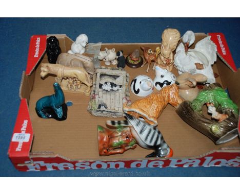 A quantity of vintage animal and bird figures including cruet, Sylvac, fine pottery swan planter, Romulus and Remus, etc.