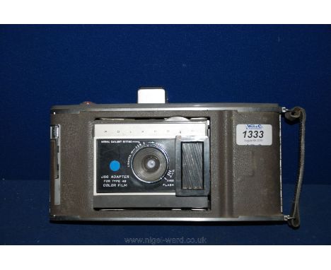An early Land Polaroid Camera.