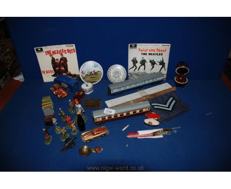 A box of miscellanea including vintage toys, trench art, floating dairy thermometer, etc.