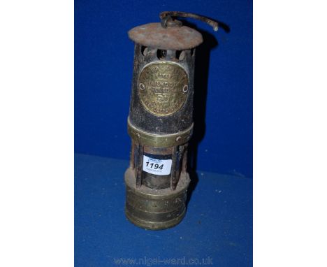 A Miner's lamp, ''Hailwood improved Lamp 501 type 01 Morley, Leeds, England''.