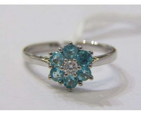 DIAMOND &amp; TOPAZ CLUSTER RING, 18ct yellow gold ring, set a central diamond, surrounded by 6 topaz in a daisy style settin