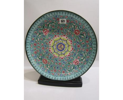 CANTON ENAMEL, a fine 19th Century turquoise ground shallow dish decorated with field of flowers, 33cm diameter 