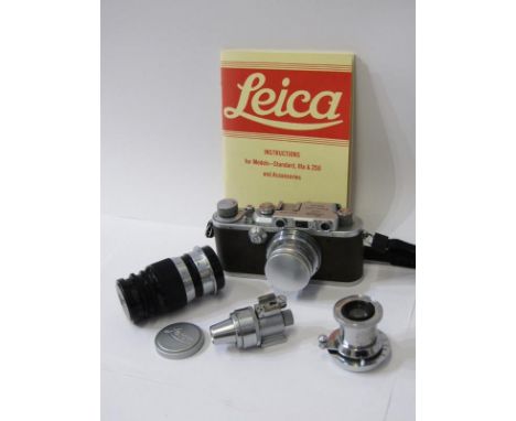VINTAGE PHOTOGRAPHY, Leica camera stamped 241078 with additional lenses and manual 