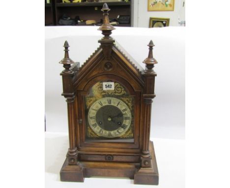 LATE VICTORIAN MANTEL CLOCK, carved walnut steeple design cased mantel clock with coiled bar strike and gilded break arch fac