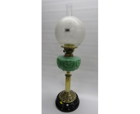 EDWARDIAN OIL LAMP, brass column support oil lamp, green milk glass reservoir and spherical shade 