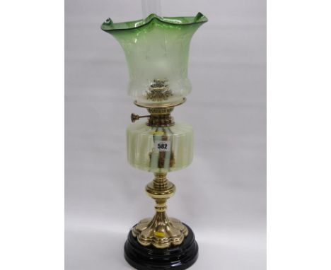 EDWARDIAN OIL LAMP, brass lobed base oil lamp with vaseline glass reservoir and etched crinoline glass shade, 54cm height 