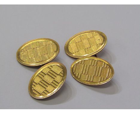 CUFF LINKS, pair of 9ct gold oval cuff links with engine turned decoration, 5.5 grams in fitted case 
