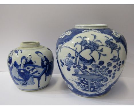 ORIENTAL CERAMICS, 2 ginger jars, 1 decorated with reserves of birds in flowering shrub with 4 character base mark, 15cm heig