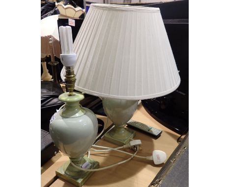 Two ceramic table lamps. All electrical items in this lot have been PAT tested for safety and have passed. This does not conf