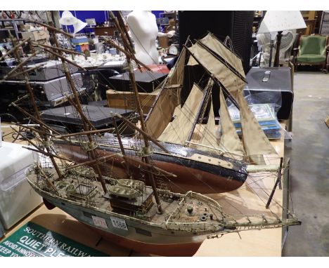 Two model ships on stands, largest H: 85 cm. Not available for in-house P&amp;P 