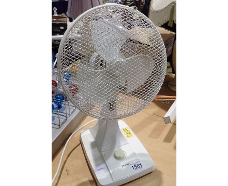 Tefal oscillating table fan. All electrical items in this lot have been PAT tested for safety and have passed. This does not 