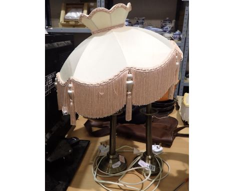 Pair of painted metal table lamps, with one shade. All electrical items in this lot have been PAT tested for safety and have 