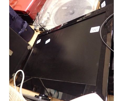 Marks and Spencer 24 inch LED TV with DVD, model MS24100F, lacking remote. Not available for in-house P&P 