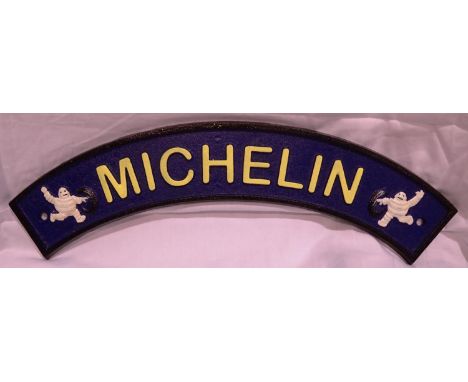 Cast iron curved Michelin sign, W: 40 cm. P&amp;P Group 1 (£14+VAT for the first lot and £1+VAT for subsequent lots) 