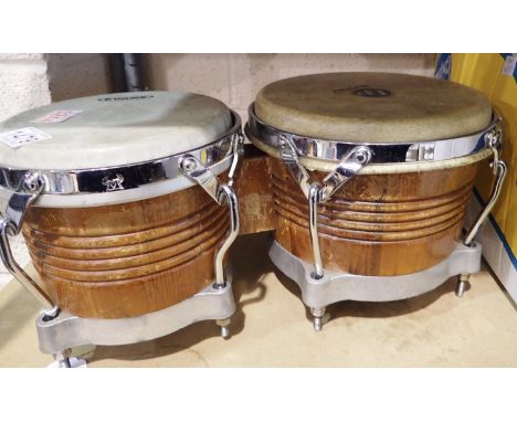 Pair of Bongo drums/Evans and LP. Not available for in-house P&amp;P 
