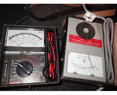 Two Megger meters. P&amp;P Group 2 (£18+VAT for the first lot and £3+VAT for subsequent lots) 