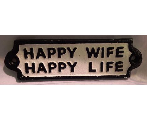 Cast iron Happy Wife Happy Life plaque, W: 12 cm. P&amp;P Group 1 (£14+VAT for the first lot and £1+VAT for subsequent lots) 